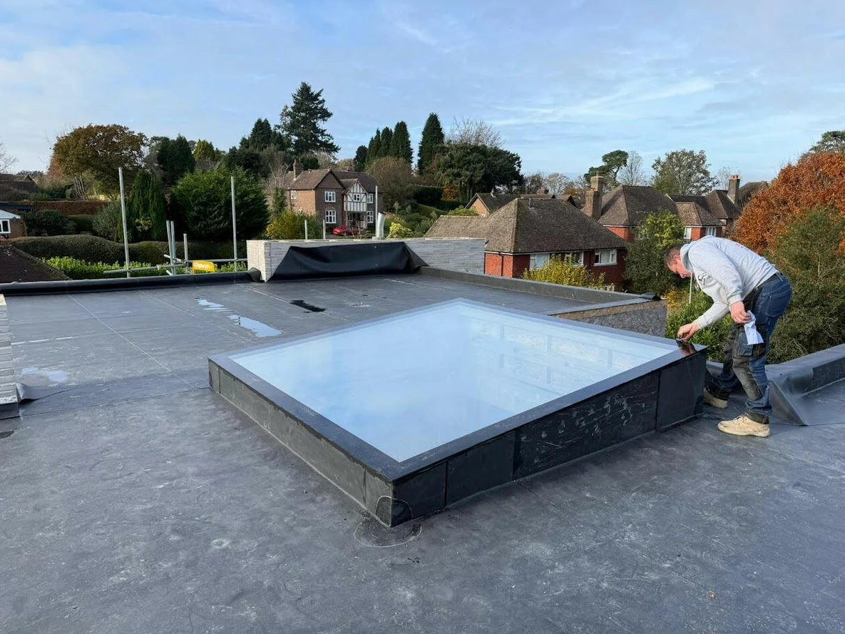 Flat roof skylight installation