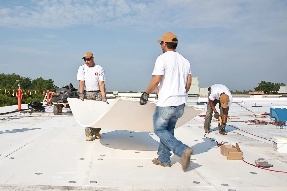 TPO membrane installation crew