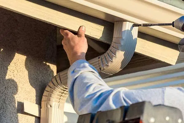 Old gutter being replaced